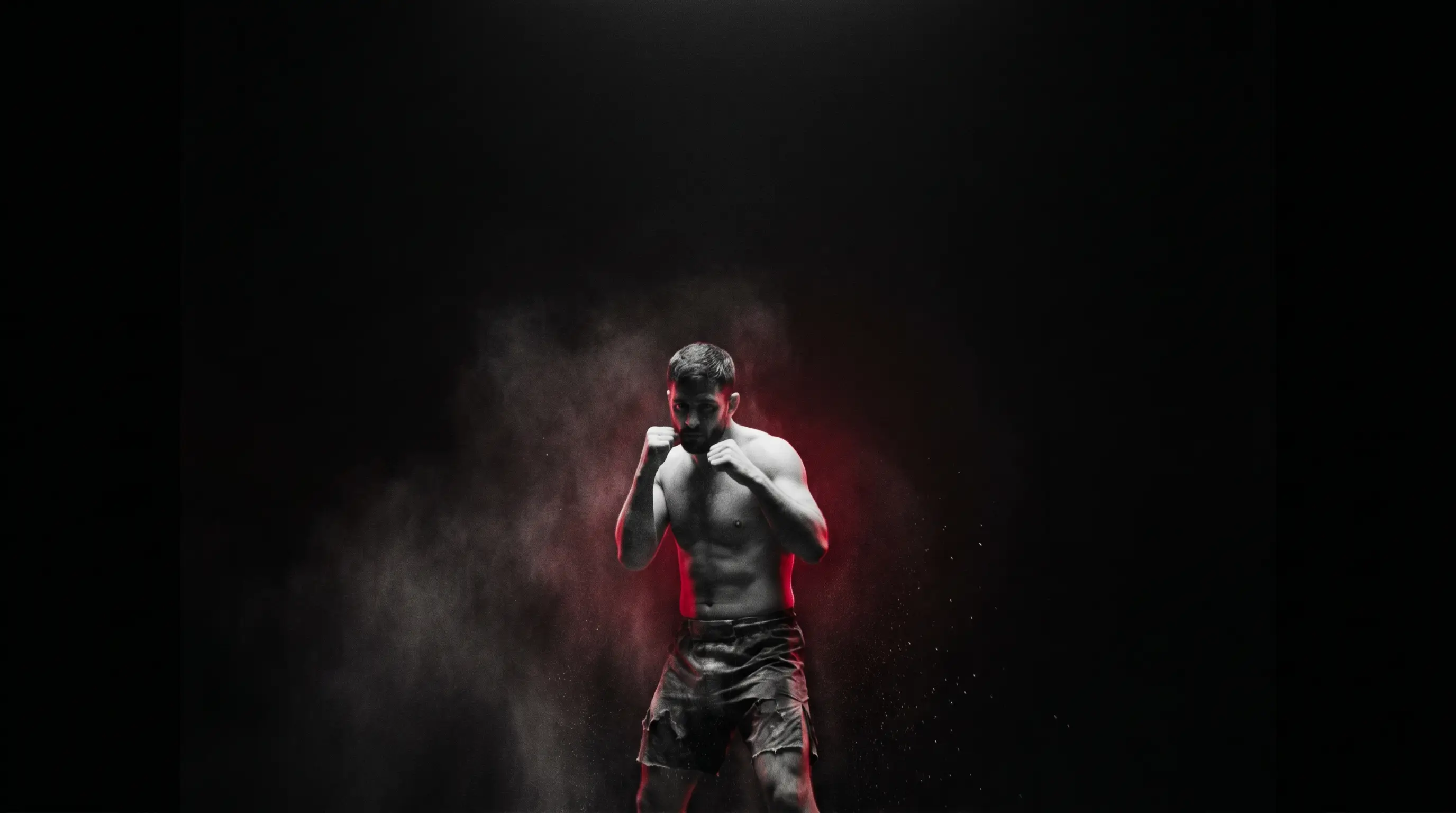 Fighter in a black void, red rim light